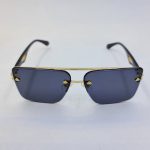 عکس از عینک آفتابی میباخ با فریم طلایی، دسته مشکی و عدسی دودی مدل GZ1290