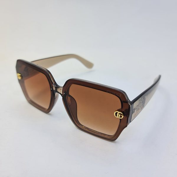 عکس از عینک آفتابی گوچی با فریم قهوه ای روشن و لنز قهوه ای uv400 مدل 3340