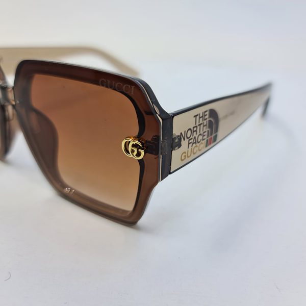 عکس از عینک آفتابی گوچی با فریم قهوه ای روشن و لنز قهوه ای uv400 مدل 3340