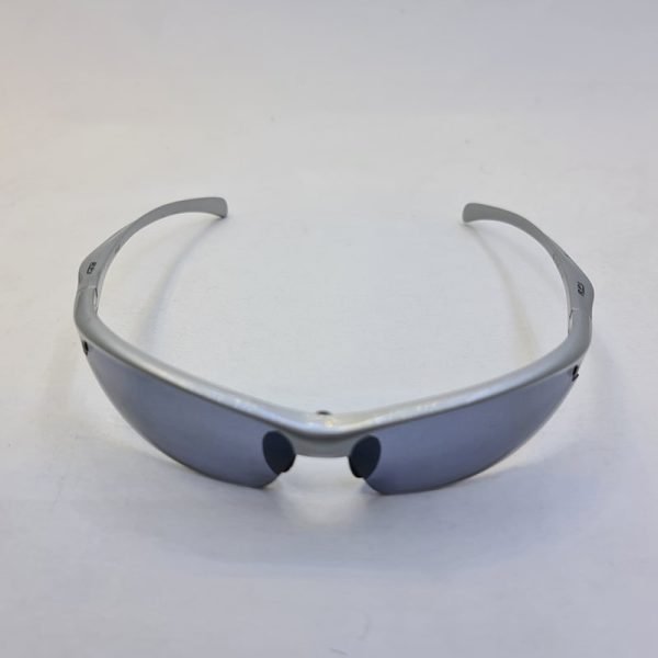 عکس از عینک ورزشی نیم فریم با دودی با فریم نقره ای رنگ مدل sj11