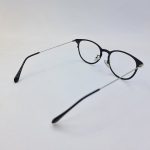 عکس از عینک طبی گرد مشکی رنگ با دسته نقره ای مدل 885232