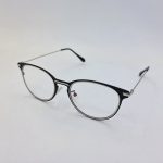 عکس از عینک طبی گرد مشکی رنگ با دسته نقره ای مدل 885232