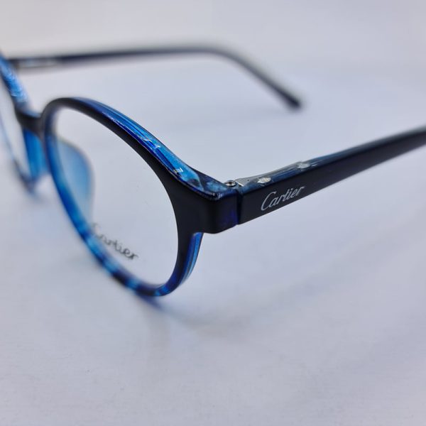عکس از فریم عینک طبی گرد با فریم کائوچو و رنگ آبی و دسته فنری مدل 2980