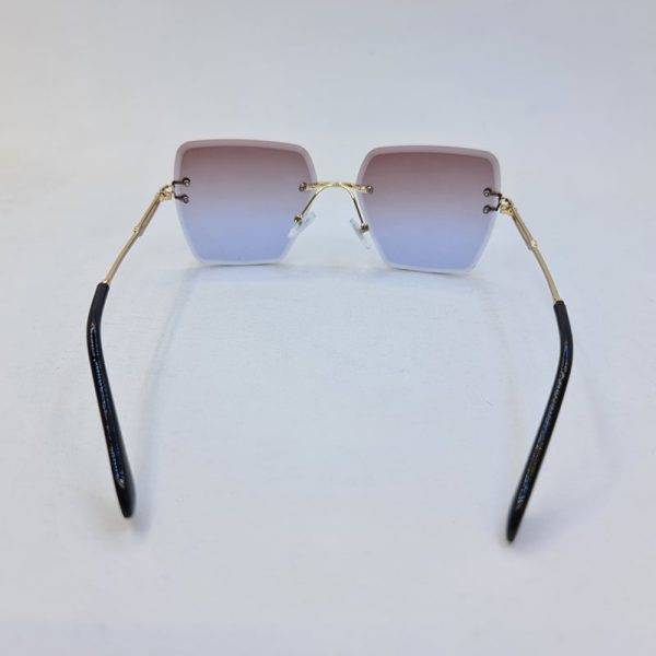 عکس از عینک آفتابی فریملس برند دیتیای با لنز دو رنگ (بنفش و آبی) مدل 9530