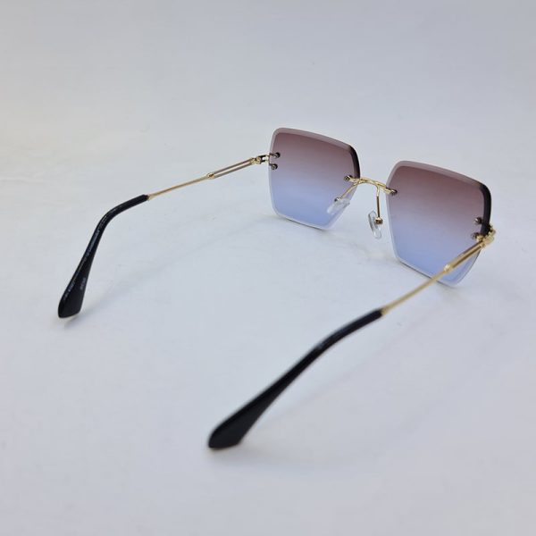 عکس از عینک آفتابی فریملس برند دیتیای با لنز دو رنگ (بنفش و آبی) مدل 9530