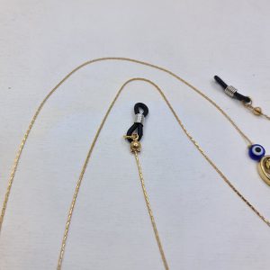 عکس از بند عینک طرح چشم زخم از جنس استیل و رنگ طلایی مدل 991916