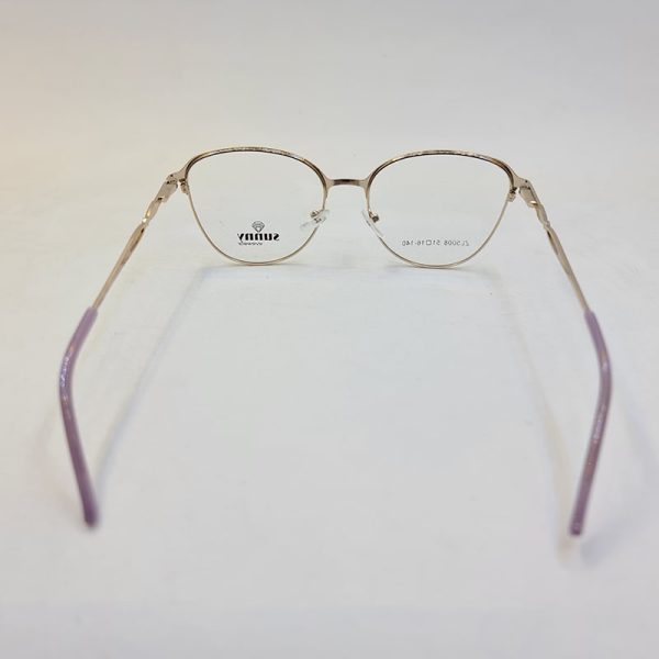 عکس از عینک طبی گرد طلایی و یاسی رنگ با دسته فنری و فریم فلزی مدل 5008