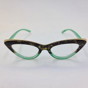 عکس از فریم عینک طبی گربه ای با رنگ سبز، مشکی و طلایی برند گوچی مدل G10A