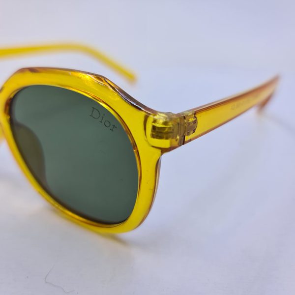 عکس از عینک آفتابی چندضلعی دیور با فریم نارنجی رنگ و عدسی سبز مدل kd98051