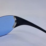 عکس از عینک آفتابی فشن DIOR با لنز یک تکه و آبی رنگ و دسته مشکی مدل 2SE