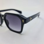 عکس از عینک آفتابی MOSCOT با فریم مربعی شکل و رنگ مشکی و عدسی دودی مدل 6029