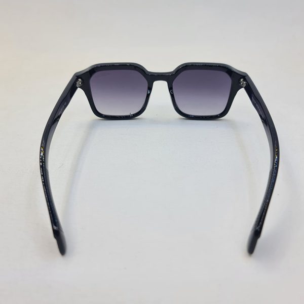 عکس از عینک آفتابی moscot با فریم مربعی شکل و رنگ مشکی و عدسی دودی مدل 6029