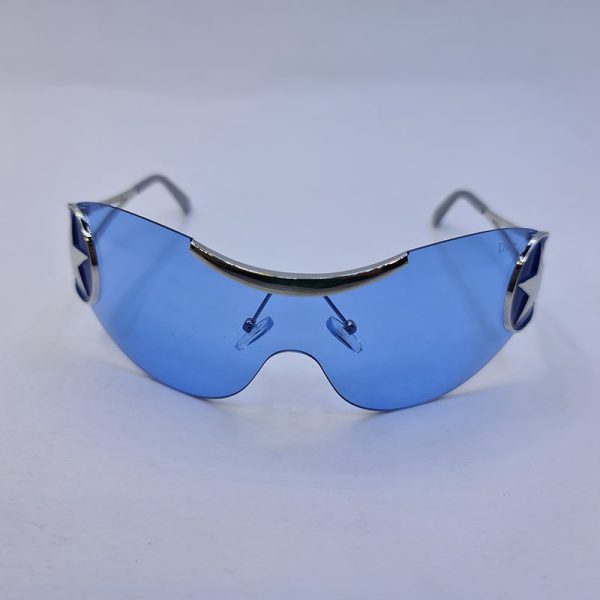عکس از عینک شب فانتزی دیور با لنز فریم لس، آبی رنگ و ستاره دار و دسته نقره ای مدل 1se