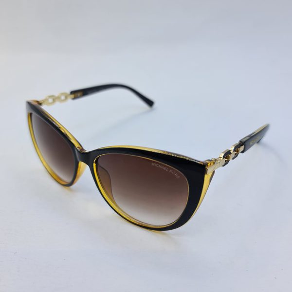عکس از عینک آفتابی زنانه با فریم گربه ای و قهوه ای رنگ michael kors مدل 3007