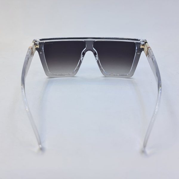 عکس از عینک آفتابی اسپورت با فریم شفاف و بی رنگ، لنز یک تکه و دودی تیره مدل 9675