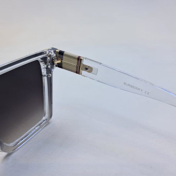 عکس از عینک آفتابی اسپورت با فریم شفاف و بی رنگ، لنز یک تکه و دودی تیره مدل 9675
