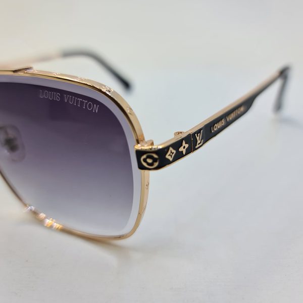 عکس از عینک آفتابی لویی ویتون با فریم طلایی و عدسی دودی هایلایت مدل 1099