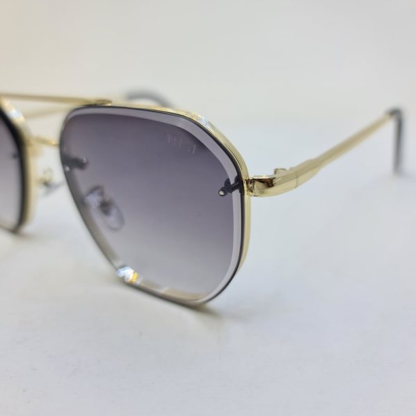 عکس از عینک آفتابی خلبانی ditiai با فریم فلزی و طلایی و لنز دودی هایلایت مدل 9682