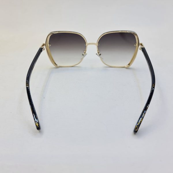 عکس از عینک آفتابی jimmy choo شاین دار با فریم طلایی و دسته مشکی رنگ مدل 28012