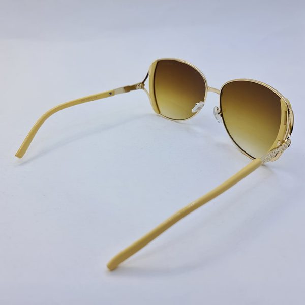 عکس از عینک آفتابی murano زنانه با فریم طلایی و شیری و لنز قهوه ای رنگ مدل 2808