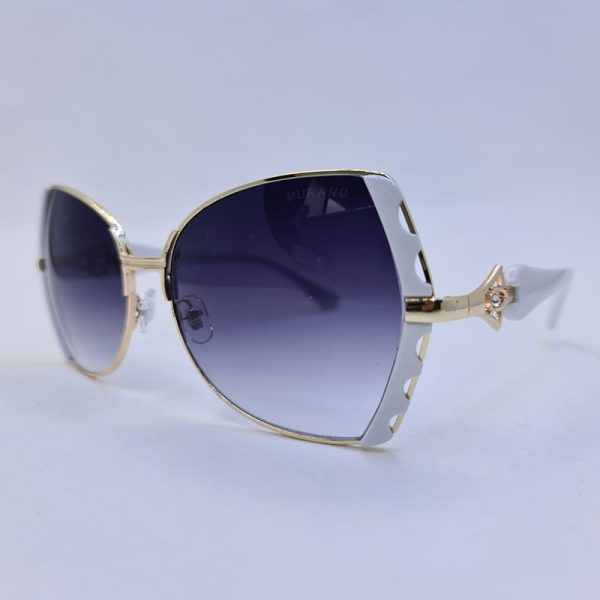 عکس از عینک آفتابی زنانه با فریم طلایی و سفید رنگ مورانو با لنز دودی مدل 7446