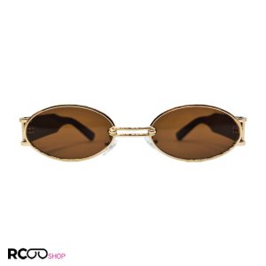 عکس از عینک آفتابی جنتل مانستر با فریم طلایی، بیضی شکل و عدسی قهوه ای مدل b2069