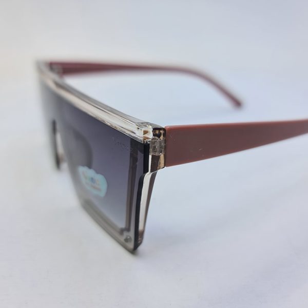 عکس از عینک آفتابی بچگانه با فریم عسلی، عدسی یکسره و دسته صورتی مدل 3700