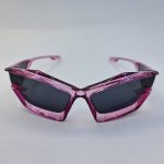 عکس از عینک آفتابی فانتزی PRADA با عدسی تیره و فریم صورتی رنگ مدل LH068