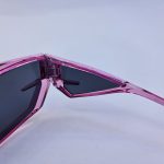 عکس از عینک آفتابی فانتزی PRADA با عدسی تیره و فریم صورتی رنگ مدل LH068