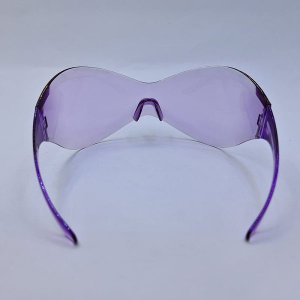 عکس از عینک دید در شب فشن، فریم لس با لنز بنفش رنگ و طرح نقاب مدل ng