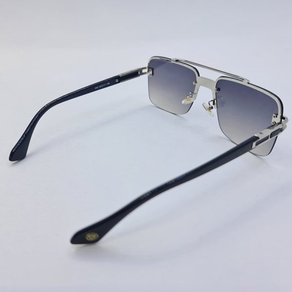 عکس از عینک آفتابی مردانه دیتا نیم فریم با رنگ نقره ای و لنز آنتی رفلکس مدل 09k