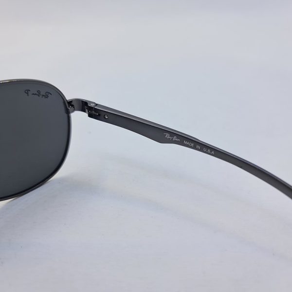 عکس از عینک آفتابی پلاریزه و خلبانی ray-ban با فریم نوک مدادی و لنز تیره مدل p2048