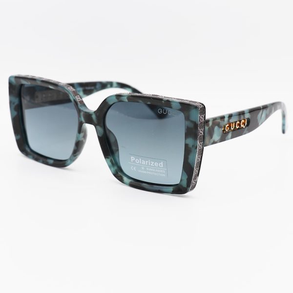 عکس از عینک آفتابی پلاریزه با فریم مشکی و سبز رنگ و مربعی شکل gucci مدل p7633