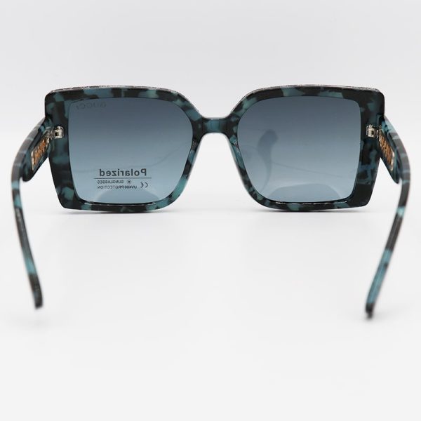عکس از عینک آفتابی پلاریزه با فریم مشکی و سبز رنگ و مربعی شکل gucci مدل p7633