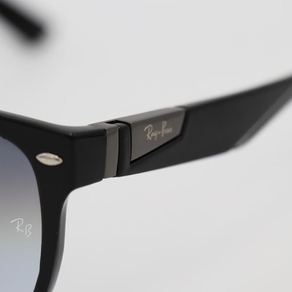 عکس از عینک آفتابی با فریم مشکی رنگ، لنز سنگ و دودی هایلایت ریبن مدل 4173