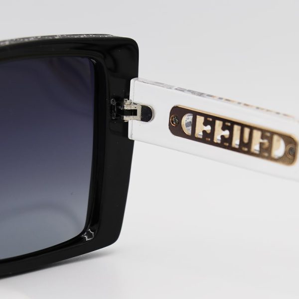 عکس از عینک آفتابی پلاریزه زنانه با فریم رنگ مشکی، مربعی و دسته شفاف گوچی مدل p7633