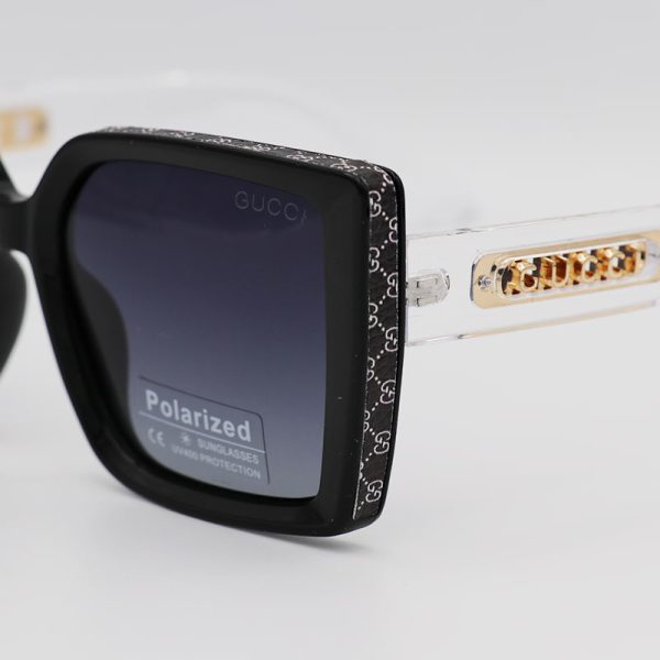 عکس از عینک آفتابی پلاریزه زنانه با فریم رنگ مشکی، مربعی و دسته شفاف گوچی مدل p7633
