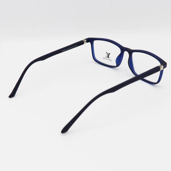 عکس از عینک طبی tr90 با فریم سورمه ای، مستطیلی شکل و دسته فنری مدل t2706