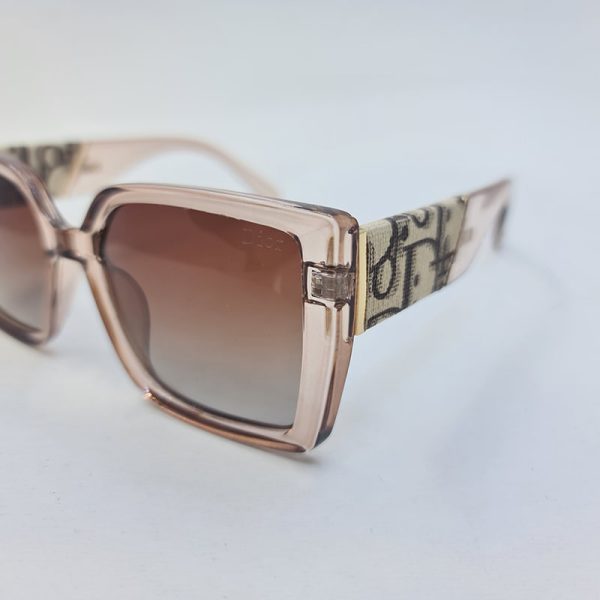 عکس از عینک آفتابی پلاریزه dior با فریم عسلی رنگ و لنز قهوه ای هایلایت مدل p1820