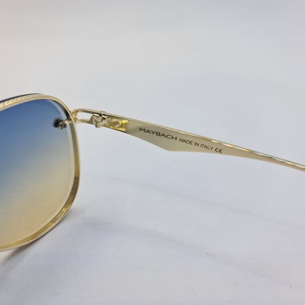 عکس از عینک آفتابی طلایی maybach با فریم فلزی و خلبانی و لنز دو رنگ مدل 63089