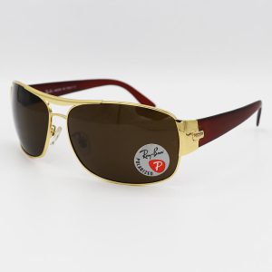 عکس از عینک آفتابی Ray-Ban با فریم طلایی، خلبانی و لنز قهوه ای، پلاریزه و سنگ مدل 3357