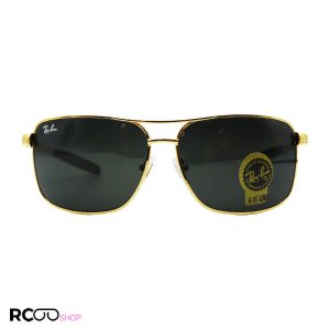 عکس از عینک آفتابی ریبن با فریم طلایی، مستطیلی شکل و لنز سنگ، دودی و آنتی رفلکس مدل am8335