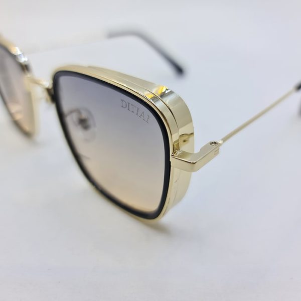 عکس از عینک آفتابی با فریم مربعی، طلایی و لنز دو رنگ ditiai مدل 9537