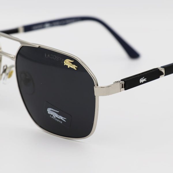 عکس از عینک آفتابی خلبانی lacoste با فریم نقره ای و لنز دودی پلاریزه مدل l125