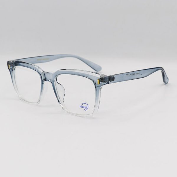 عکس از عینک بلوکات با فریم آبی رنگ، کائوچو و مربعی برند moscot مدل tr86012