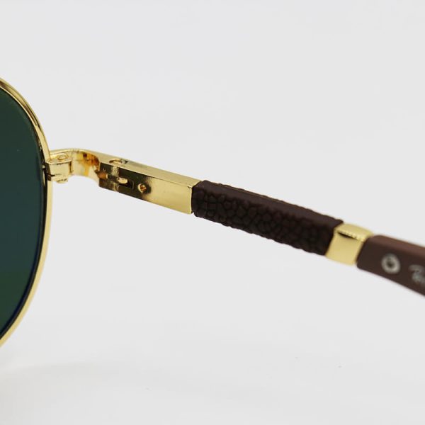 عکس از عینک آفتابی آنتی رفلکس با فریم خلبانی، طلایی و لنز سنگ و سبز ریبن مدل rb3577