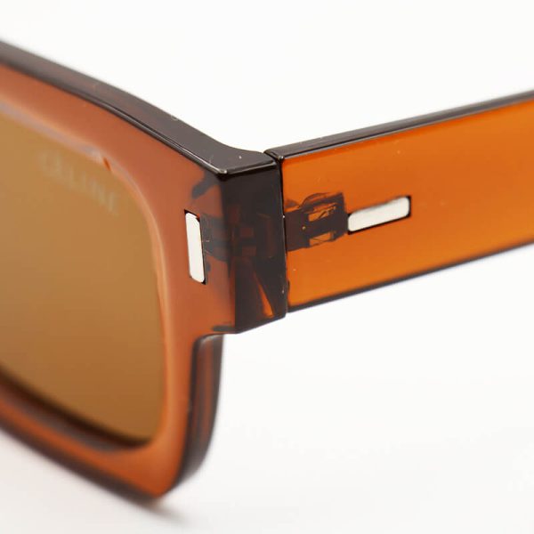 عکس از عینک آفتابی مستطیلی شکل celine با فریم قهوه‌ای و لنز تیره مدل m655
