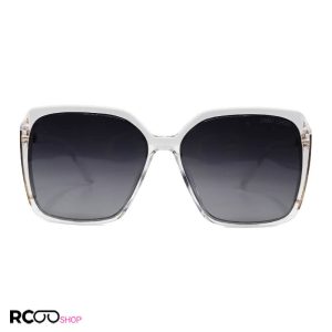 عکس از عینک آفتابی زنانه با فریم بی رنگ و شفاف، شاین دار و لنز دودی jimmy choo مدل 7204