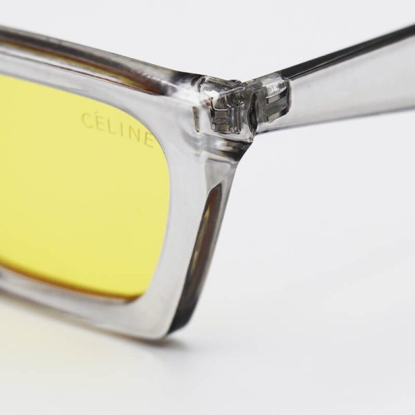 عکس از عینک دید در شب با فریم چشم گربه‌ای، طوسی رنگ و لنز زرد celine مدل g677
