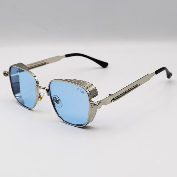 عکس از عینک شب dior با طرح پیچ و فنر، فریم نقره ای و عدسی آبی رنگ مدل 8047